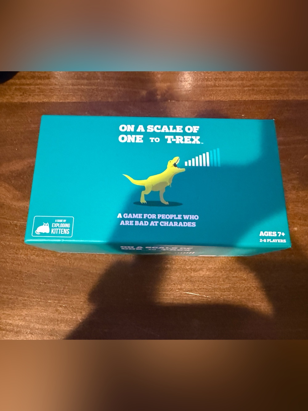 On a Scale of One to T-Rex Party Game - Teal Box